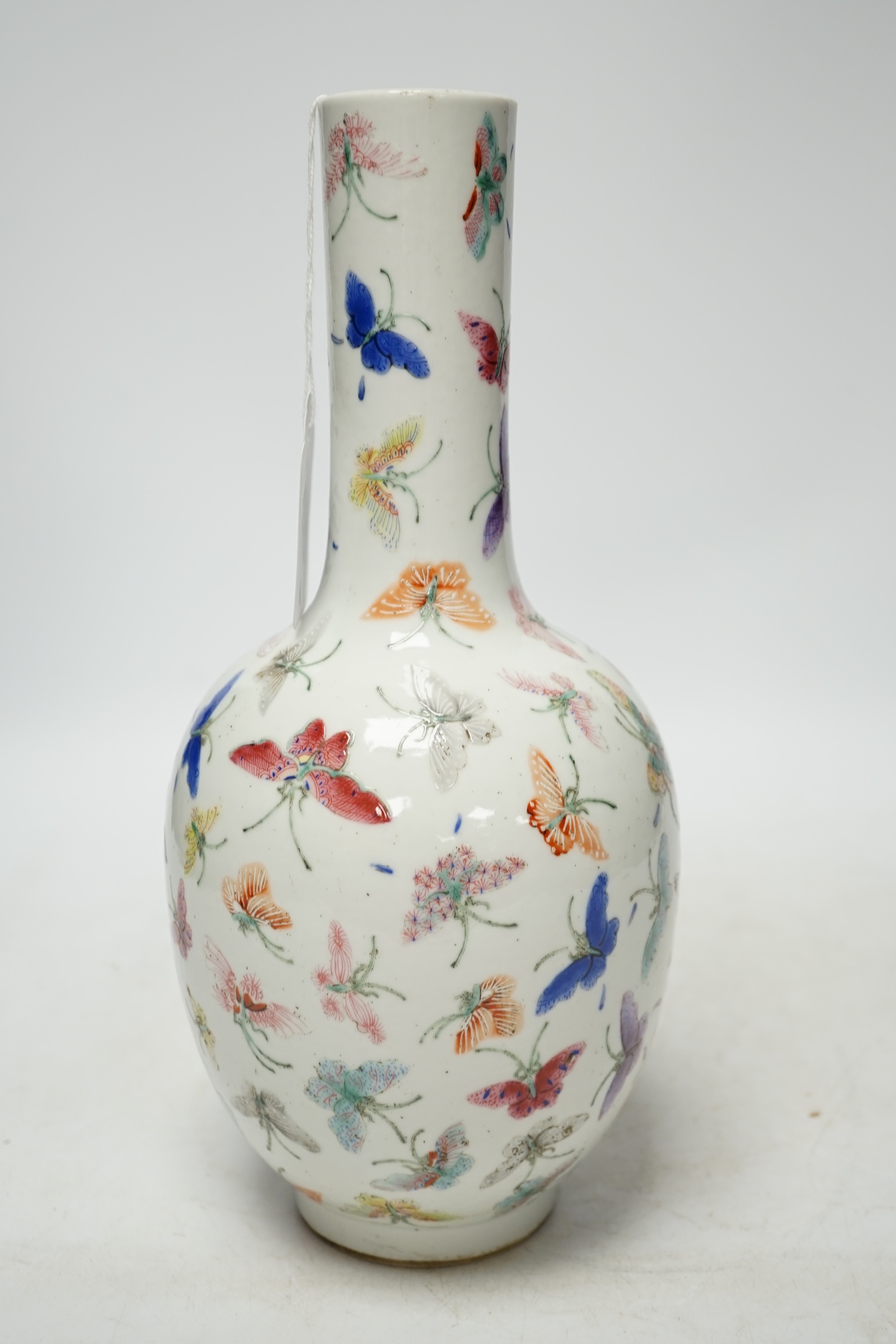 A Chinese famille rose ‘butterflies’ vase, 29cm high. Condition - good, light scratches to footrim, otherwise good. Guangxu marks